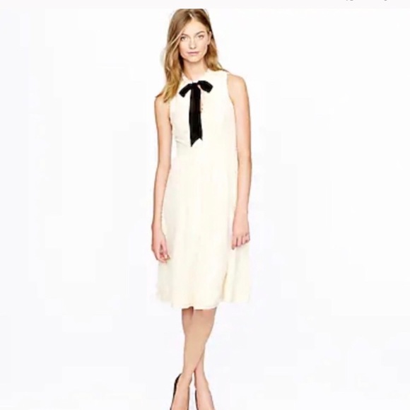 dress with bow at neck